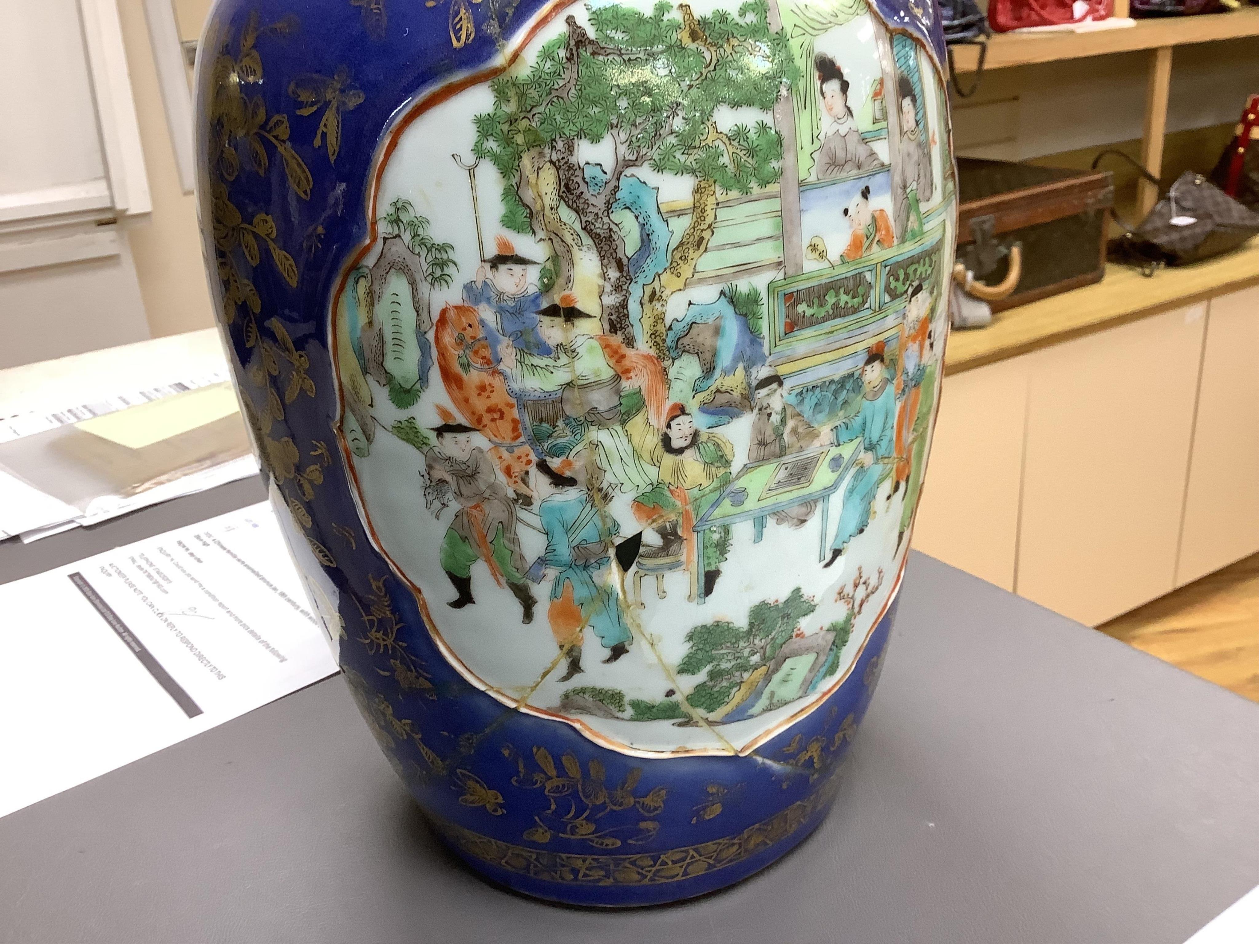 Three early 18th century Chinese Imari dishes (one clobbered), largest 46.5cm, together with a 19th century Chinese powder blue ground vase, 44cm high and a horn carving, 13.7cm (5)